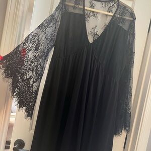 Black lace long sleeve dresss with V neckline and lace back. Empire waist.